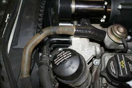 4. Connect Fuel Lines by: a. Routing fuel line under the Inlet Manifold between the Bypass Valve and the Supercharger unit.