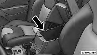 Do not operate this vehicle with a console compartment lid in the open position.