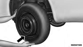 9. Install the wheel bolts with the threaded end of the wheel bolt toward the wheel. Lightly tighten the wheel bolts. 12. Securely stow the jack, tools, chocks and flat tire.