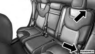 To Lower The Rear Seat 1. Lift the seatback release lever located on the upper outer edge of the seat or pull the pull strap located on the middle outer edge of the seat.