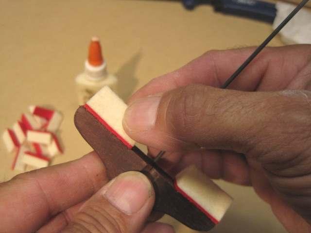 Many times, the preferred practice is to reinstall the damper heads and wires in the piano, then glue the damper felts in place, using the strings themselves to serves as the clamps while the glue