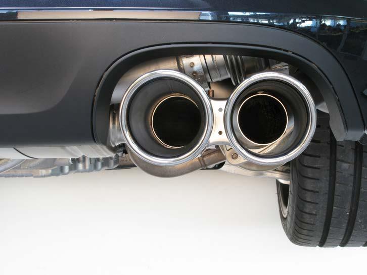 17. Slide the tail-pipes onto the muffler outlets.