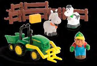 Features John Deere tractor with loader and wagon.