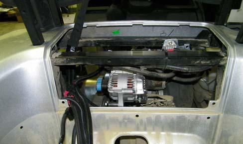 Refer to the install manual for the heater mounting kit for additional details. 3.2 See Figures 3.2a thru d. Locate the power supply harness (9SV-WH-00065). Fig. 3.2a (Fused End of Power Supply Harness) Route the power supply harness through the rear engine compartment.