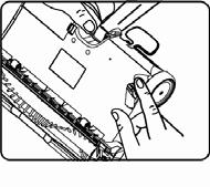 8. Slip the belt over the brush bar cap. 9. Insert the brush bar into the slot. (Fig. 14) 10. Insert the gear box tabs into the tab slots and push down until it clicks into place. 11.