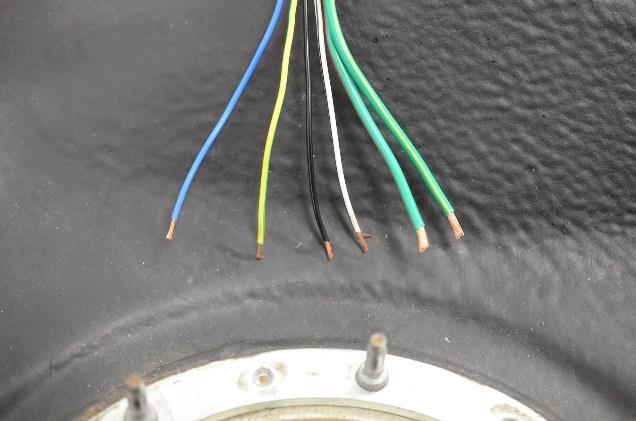 20. Cut off the OEM external 6-position fuel pump connector leaving as much slack as possible. Strip the ends of the wires, as shown. 21.