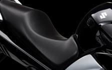 The rear section of the stylish seat is raised so passenger can see over the shoulder of the rider so both are