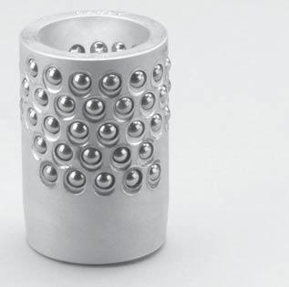 The ball bearings are arranged in the cage in a spiral pattern to minimize tracking or grooving and assure uniform wear.