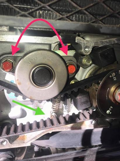 Release the spring tensioner off the