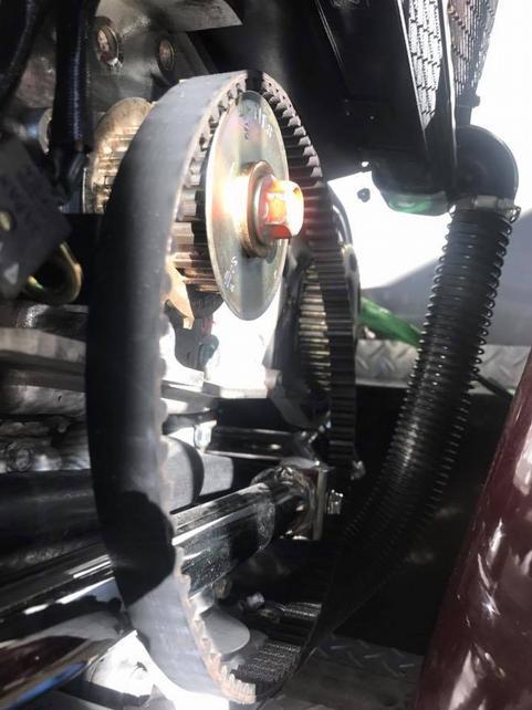 Remove the other spring and tensioner from
