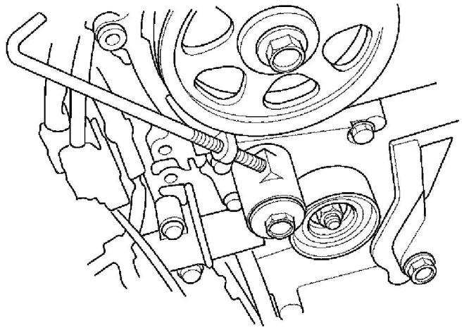 9. Install the auto-tensioner. NOTE: Make sure the pin stays in place. 10.