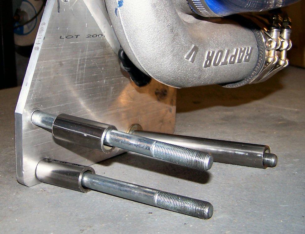 Locate the three long 19mm bolts supplied from your kit and the three stainless steel