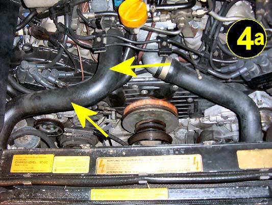 Remove the cold air intake tubes and air filter top again as you did before in Picture 2.