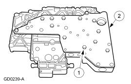 6. Remove the main control valve body cover plate. 1. Remove the thirteen bolts. 2. Remove the valve body cover plate and gasket. Assembly 1.