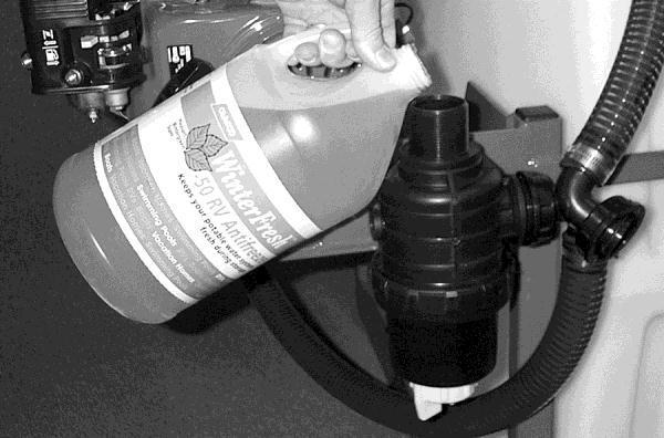 WINTER STORAGE Clean the tank with soap and water. Pump some of the soap solution through the hose and gun by spraying the gun into the tank through the top opening.