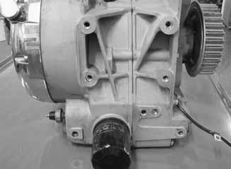 Lower engine jack slightly until throttle body can be released from intake adapters (Q). NOTE: Attach engine securely to an engine stand to prevent damage and for ease of disassembly.