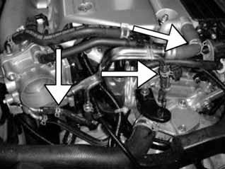 p. Pull the inlet tube out of the grommet and remove from the vehicle. q.