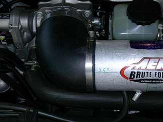 j. Install the long end of the rubber elbow over the throttle body
