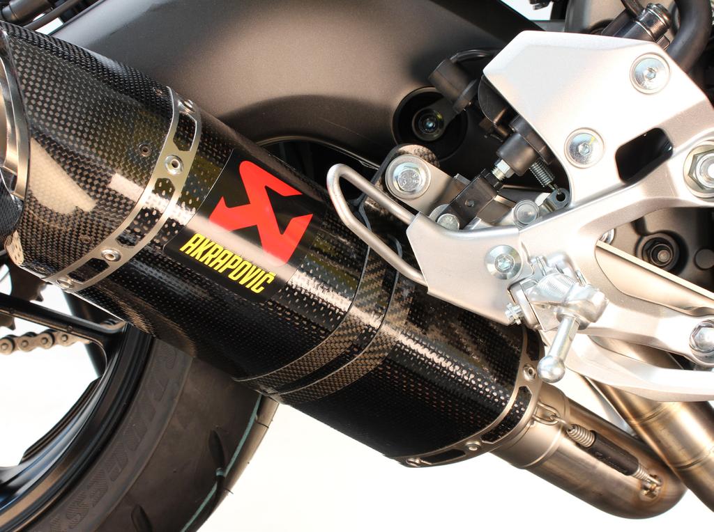 7. Align the muffler in respect to the swing arm and tighten the clamp s bolt to the specified torque