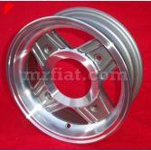 .. RS-500-044 RS-500-045 RS-500-046 This is one new red millemiglia alloy wheel 5 x 12 including hub cap and bolts. Fits on.