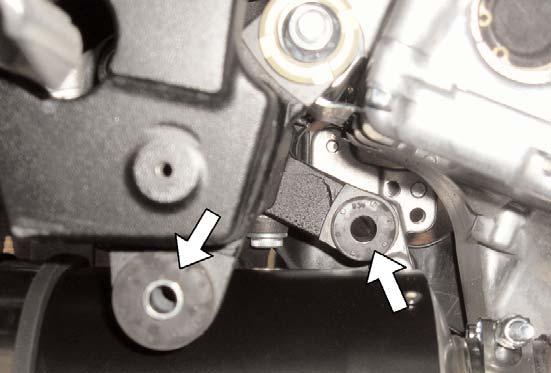 1) Make sure the motorcycle is cool and place securely on a service lift or center stand. 2) Remove both the left and right lower fairings.