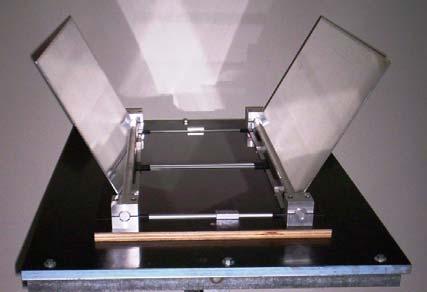more sunlight onto a solar cell. The Solar Intensifier unit is designed to increase efficiency and performance of a set of solar panels. The unit was fabricated and tested.