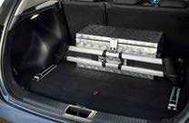Sportswagon s clever luggage rail system: The vertical rails can be fitted with flexible aluminium bars and adjusted individually to suit different sizes and requirements.