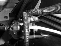 If this is the case for your vehicle, remove the self-tapper and use the supplied bolt, washers, and locknut to re-attach the brake cable bracket and the