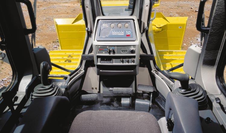 OPERATOR S S COMPARTMENT All steering, direction, and speed changes are made by a left-hand single joystick control.