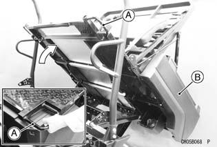 Cargo Bed WARNING Reduced clearance between the cargo bed and the ROPS can cause arm injury when lifting or lowering the cargo bed.