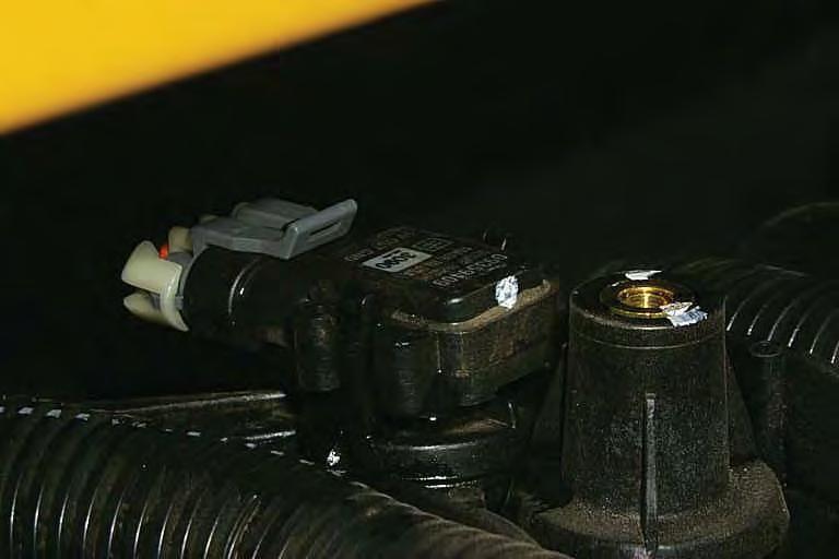 At the rear of the of the intake manifold disconnect the Manifold Absolute Pressure (MAP) sensor