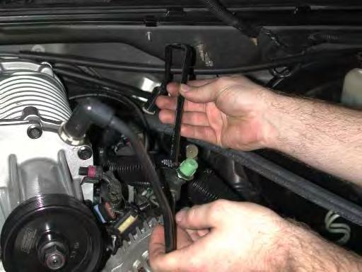 108. Reinstall the EVAP tube on the EVAP solenoid at the front of the