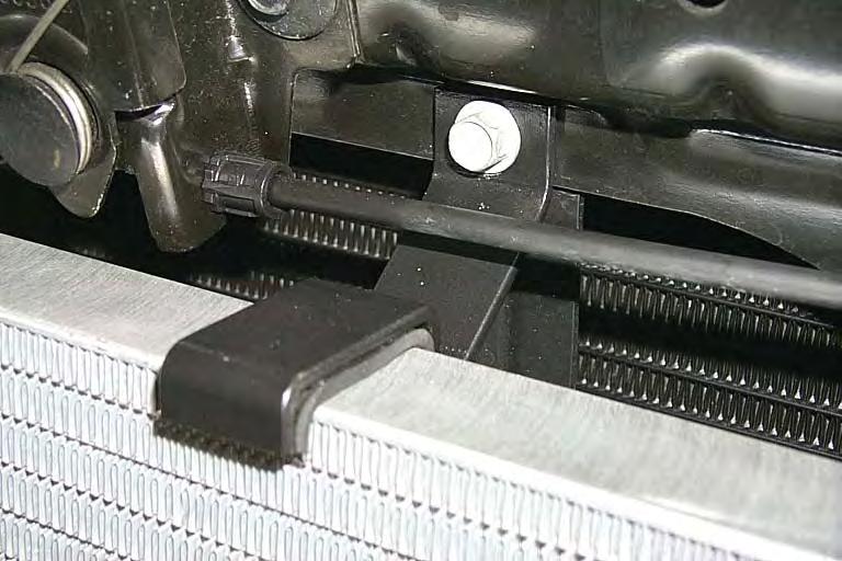 For vehicles without a transmission cooler, a bolt and nut are supplied.