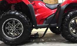 Position the lift strap through the loop in the cable and around a secure portion on the front of your atv.