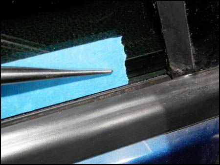 Apply tape horizontally to about 1 inch (15 mm) from the rear edge of the passenger and driver side windows and about 1 inch (15 mm)