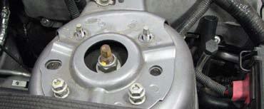 Route the molded hose under the fuse box and onto the inlet at the top of the water pump. Secure it with a clamp. 78.