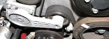 Reconnect the fuel line to the fuel rail and secure it with the