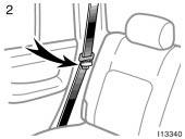 2. Make sure the shoulder belt passes through the hanger when folding the second seat.