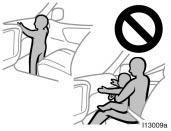Do not allow a child to stand up or kneel on the front passenger seat. The front passenger airbag inflates with considerable speed and force and the child may be killed or seriously injured.