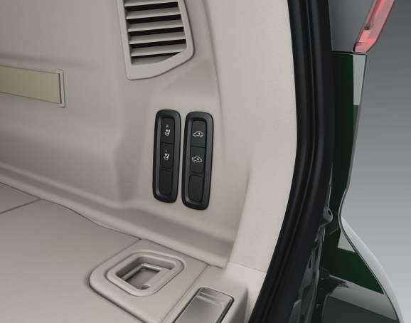 If the vehicle is equipped with the rear seat electric backrest folding function*, there are also buttons for this in the cargo compartment.