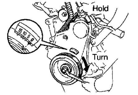 1. Align the matchmark by pulling the timing belt up on the water pump pulley side while turning the crankshaft pulley counterclockwise. 2.