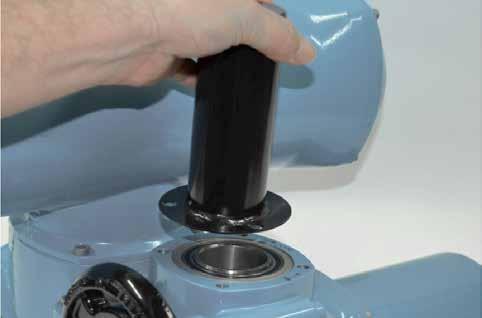 Lower the actuator onto the threaded valve stem, engage HAND operation and wind the handwheel in the open direction to engage the drive bush onto the valve stem.