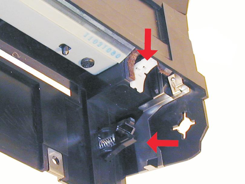 Figure 31 Figure 32 26) Install both the white magnetic roller holders into place