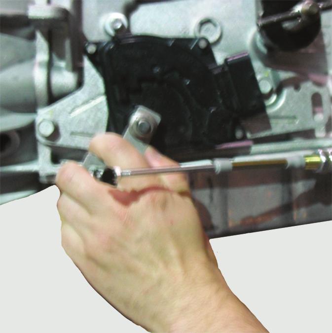 4. Manually move the transmission shift arm into the Park position. (Figure 4) Figure 4 5.