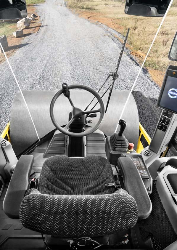Operator Environment The ROPS/FOPS certified cab provides a safe and comfortable working environment with an efficient heating and air conditioning system