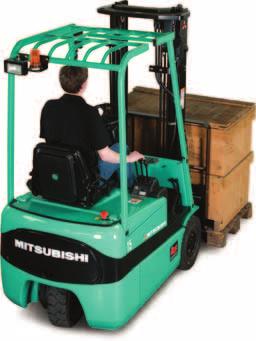 Ergonomic operator compartment equipped with adjustable steering column, short and easily reached hydraulic levers and other carefully positioned controls reduces driver fatigue and