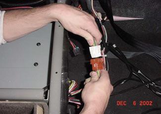 21) PLUG THE OTHER END OF THE CONTROL HARNESS INTO THE NO-IDLE UNITS HARNESS AS SHOWN.