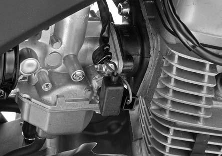 Tighten the carburetor top securely. Install the following: Right side cover (page 2-2) Right side shroud (page 2-4) After installing the throttle valve, check the following.