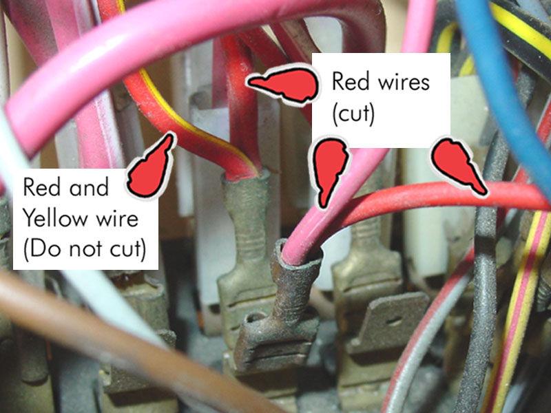 The top end of the fuse will have 2 or 3 red wires in two connectors, and one red wire has a yellow stripe.