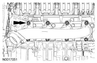 64. Clean and inspect the RH exhaust manifold. For additional information, refer to Section 303-00. 65. Remove and discard the 8 RH exhaust manifold studs. 66.
